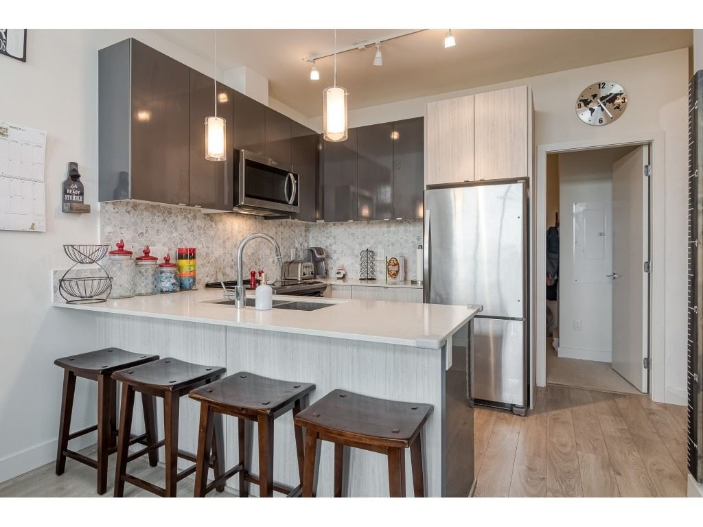 Main Photo: 407 6438 195A Street in Surrey: Clayton Condo for sale in "YALE BLOC" (Cloverdale)  : MLS®# R2463113