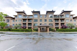 Photo 2: 110 2558 PARKVIEW Lane in Port Coquitlam: Central Pt Coquitlam Condo for sale in "THE CRESCENT" : MLS®# R2578828