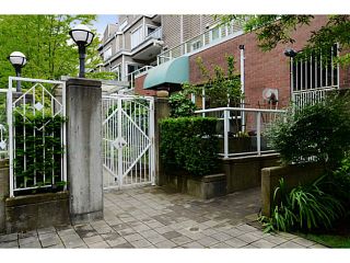Photo 1: 101 789 W 16TH Avenue in Vancouver: Fairview VW Condo for sale in "CAMBIE VILLAGE" (Vancouver West)  : MLS®# V1071791