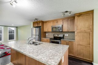 Photo 5: 51 cranford Way SE in Calgary: Cranston Row/Townhouse for sale : MLS®# A2021458