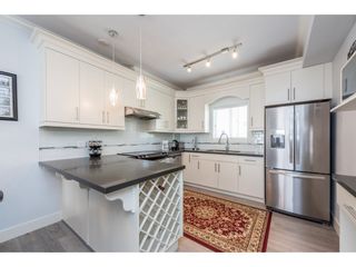 Photo 3: 208 3488 SEFTON Street in Port Coquitlam: Glenwood PQ Townhouse for sale in "SEFTON SPRINGS" : MLS®# R2165688