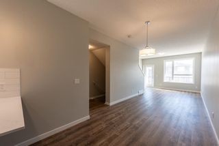 Photo 6: 123 301 REDSTONE Boulevard in Calgary: Redstone Row/Townhouse for sale : MLS®# A1246264