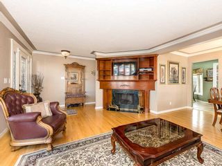 Photo 5: 411 Wilkinson Place SE in Calgary: Willow Park Detached for sale : MLS®# A2096753