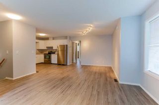 Photo 2: 37 Ross Place: Crossfield Semi Detached (Half Duplex) for sale : MLS®# A2079461
