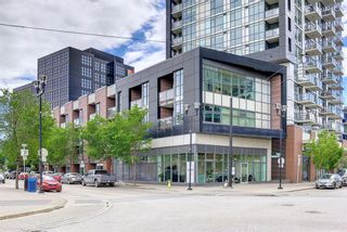 Photo 1: 320 619 Confluence Way SE in Calgary: Downtown East Village Apartment for sale : MLS®# A1234752