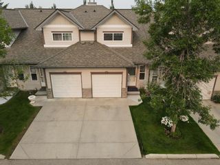 Photo 1: 57 Millview Green SW in Calgary: Millrise Row/Townhouse for sale : MLS®# A1135265
