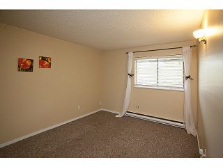 Photo 13: 112 5294 204TH Street in Langley: Langley City Condo for sale in "Water's Edge" : MLS®# F1406481