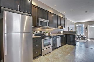 Photo 12: 4514 73 Street NW in Calgary: Bowness Row/Townhouse for sale : MLS®# A1081394