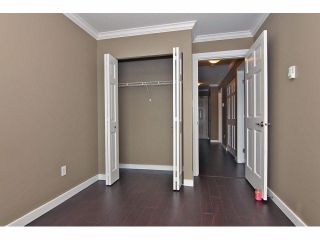 Photo 15: 301 2780 WARE Street in Abbotsford: Central Abbotsford Condo for sale in "Chelsea House" : MLS®# R2110446