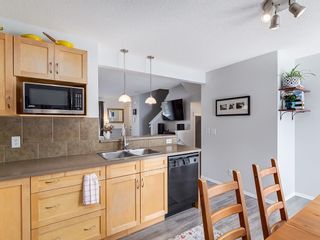 Photo 11: 165 Panatella Park NW in Calgary: Panorama Hills Row/Townhouse for sale : MLS®# A2035973