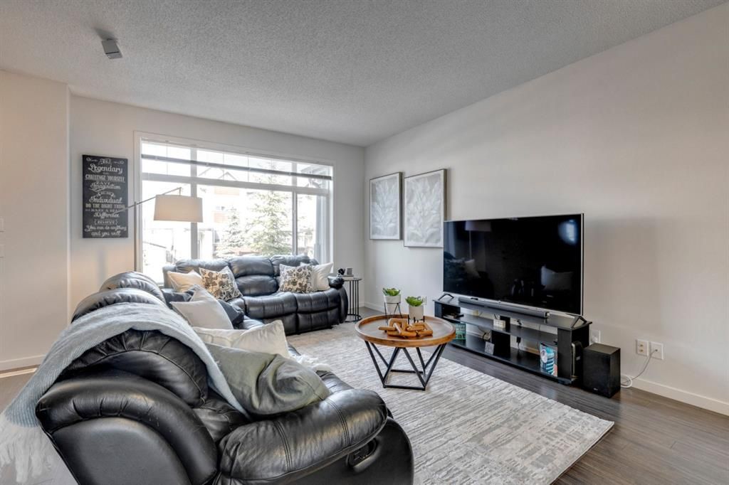 Main Photo: 24 Copperpond Close SE in Calgary: Copperfield Row/Townhouse for sale : MLS®# A1195987