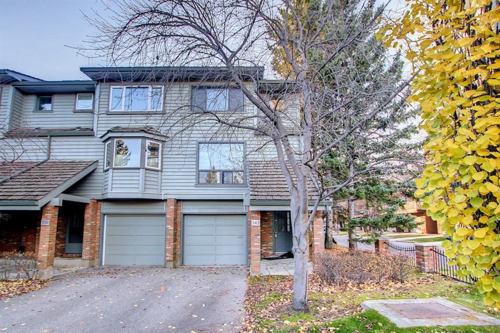 Main Photo: 143 Point Drive NW in Calgary: Point McKay Row/Townhouse for sale : MLS®# A1157621