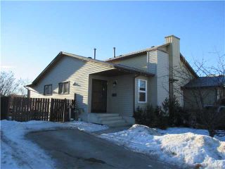 Photo 1: 220 DEERVIEW Court SE in CALGARY: Deer Ridge Residential Attached for sale (Calgary)  : MLS®# C3598033