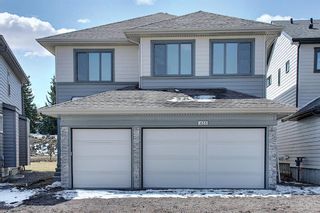 Photo 1: 433 Shawnee Boulevard SW in Calgary: Shawnee Slopes Detached for sale : MLS®# A1098238