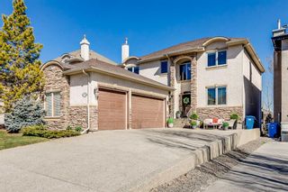 Photo 1: 16 Coulee Park SW in Calgary: Cougar Ridge Detached for sale : MLS®# A2125322