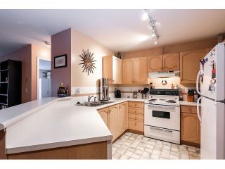 Photo 3: # 101 10756 138TH ST in Surrey: Whalley Condo for sale (North Surrey)  : MLS®# F1444754