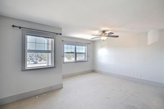 Photo 17: 63 Wentworth Common SW in Calgary: West Springs Row/Townhouse for sale : MLS®# A1124475