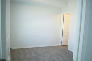 Photo 11: 311 80 Carrington Plaza NW in Calgary: Carrington Apartment for sale : MLS®# A2119837