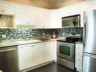 Photo 3: 401 3176 PLATEAU Boulevard in Coquitlam: Westwood Plateau Condo for sale in "TUSCANY" : MLS®# V1107282