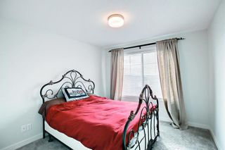 Photo 24: 1302 Jumping Pound Common: Cochrane Row/Townhouse for sale : MLS®# A1202528