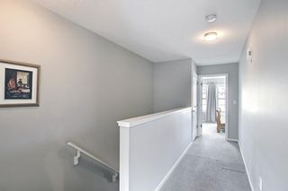 Photo 11: 314 Ascot Circle SW in Calgary: Aspen Woods Row/Townhouse for sale : MLS®# A1111264