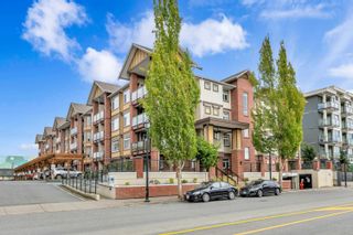 Photo 1: 421 5650 201A Street in Langley: Langley City Condo for sale in "Paddington Station" : MLS®# R2716126