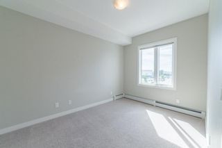 Photo 11: 2305 604 EAST LAKE Boulevard NE: Airdrie Apartment for sale : MLS®# A1238453