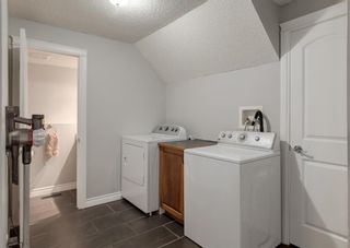 Photo 32: 563 Woodpark Crescent SW in Calgary: Woodlands Detached for sale : MLS®# A1095098