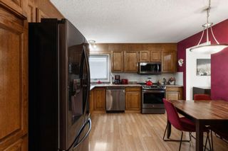 Photo 9: 7 Woodmont Rise SW in Calgary: Woodbine Detached for sale : MLS®# A1092046