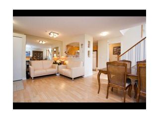 Photo 1: 62 7128 STRIDE Avenue in Burnaby: Edmonds BE Townhouse for sale in "RIVERSTONE" (Burnaby East)  : MLS®# V899687