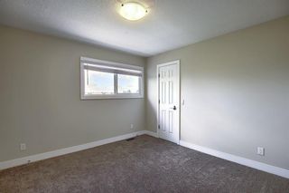 Photo 13: 9 1603 MCGONIGAL Drive NE in Calgary: Mayland Heights Row/Townhouse for sale : MLS®# A1015179