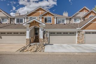 Photo 1: 10 Discovery Heights SW in Calgary: Discovery Ridge Row/Townhouse for sale : MLS®# A1237140