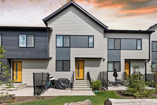 Photo 1: 808 Redstone Crescent NE in Calgary: Redstone Row/Townhouse for sale : MLS®# A1231652