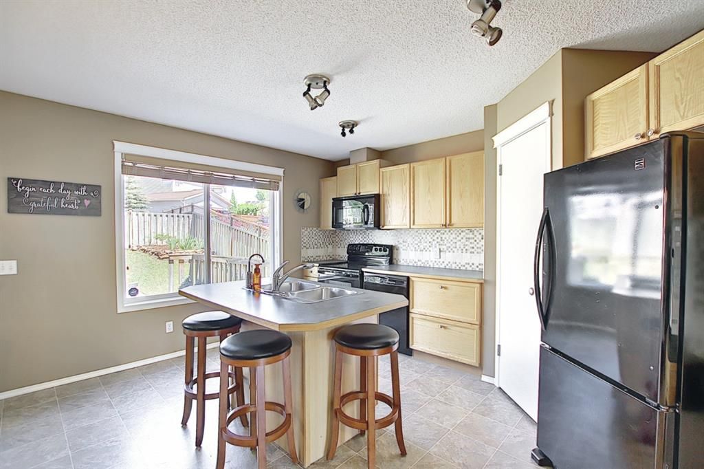Photo 18: Photos: 83 Tuscany Springs Way NW in Calgary: Tuscany Detached for sale : MLS®# A1125563