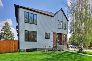 Photo 1: 2040 25A Street SW in Calgary: Richmond Row/Townhouse for sale : MLS®# A1228620