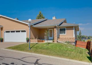 Photo 1: 42 140 Strathaven Circle SW in Calgary: Strathcona Park Semi Detached for sale : MLS®# A1146237