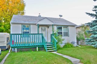 Photo 1: 7412 34 Avenue NW in Calgary: Bowness Detached for sale : MLS®# A2074941