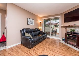 Photo 4: 10531 HOLLY PARK Lane in Surrey: Guildford Townhouse for sale in "HOLLY PARK LANE" (North Surrey)  : MLS®# R2147163
