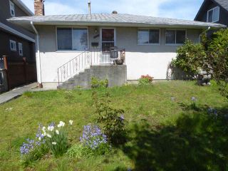 Photo 1: 1821 UPLAND Drive in Vancouver: Fraserview VE House for sale in "N" (Vancouver East)  : MLS®# R2165255