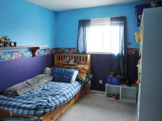 Photo 12: 52 WEST HALL Place: Cochrane Residential Detached Single Family for sale : MLS®# C3553892