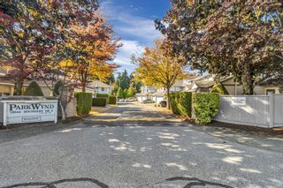 Photo 1: 110 12044 S BOUNDARY Drive in Surrey: Panorama Ridge Townhouse for sale in "Parkwynd in Boundary Park" : MLS®# R2725596