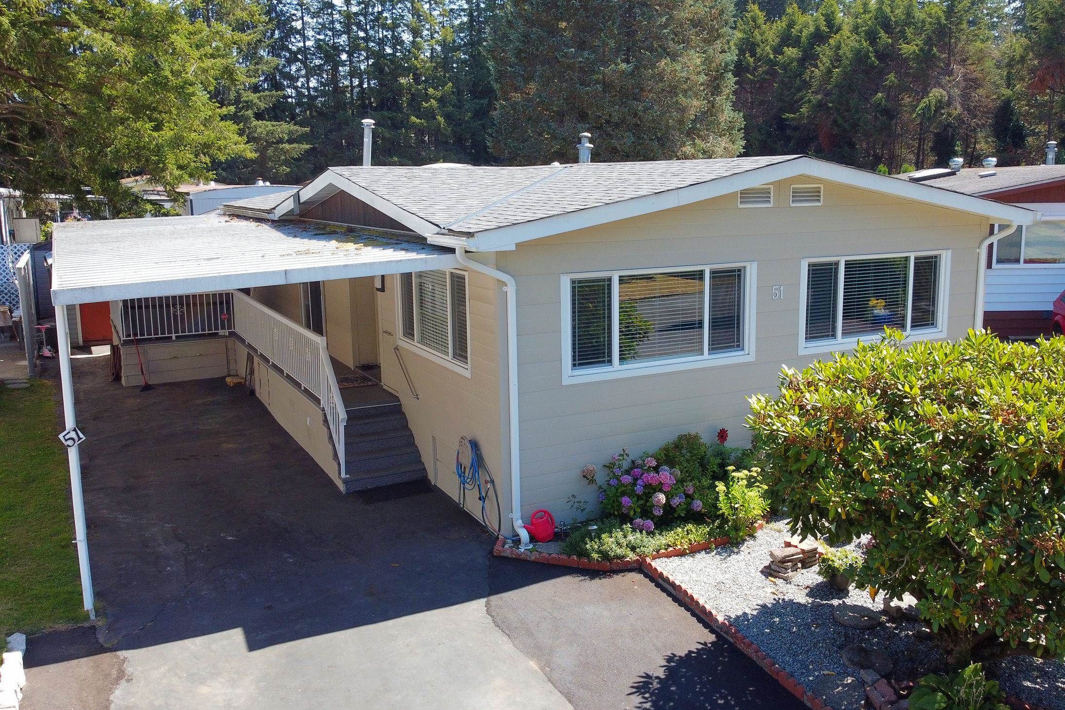 Main Photo: 51 2305 200 Street in Langley: Brookswood Langley Manufactured Home for sale in "Cedar Lane" : MLS®# R2609129