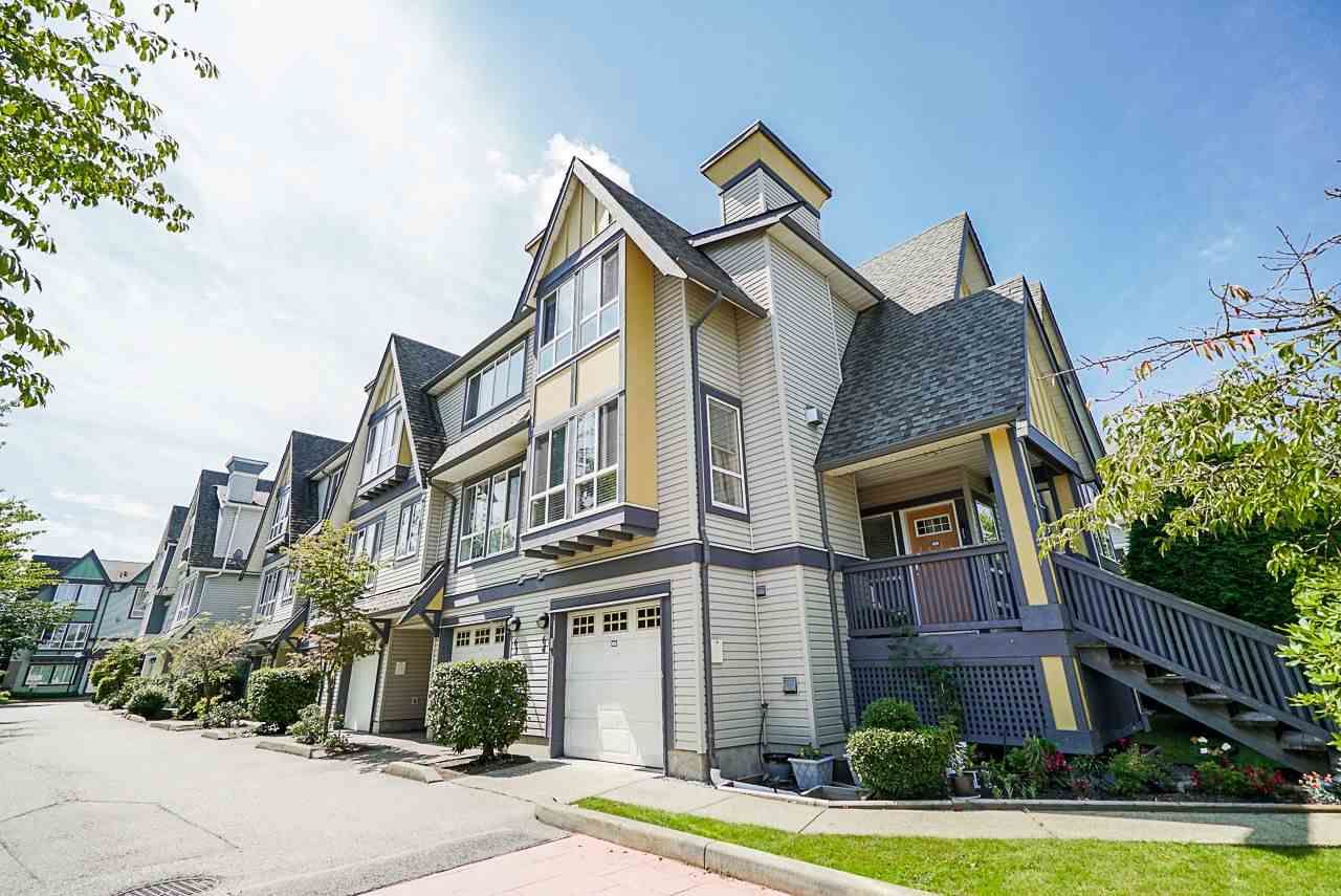 Main Photo: 64 16388 85 Avenue in Surrey: Fleetwood Tynehead Townhouse for sale in "CAMELOT VILLAGE" : MLS®# R2486322