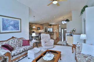 Photo 8: 12 Strathridge Way SW in Calgary: Strathcona Park Detached for sale : MLS®# A2046710