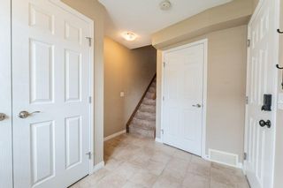 Photo 4: 428 Windstone Grove SW: Airdrie Row/Townhouse for sale : MLS®# A2052115