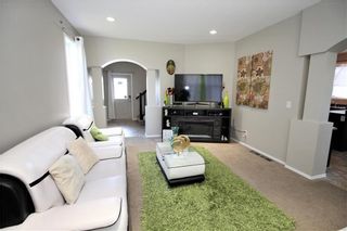 Photo 2: 77 AUDETTE Drive in Winnipeg: Canterbury Park Residential for sale (3M)  : MLS®# 202013163