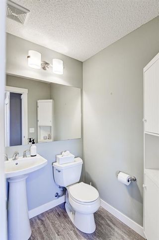 Photo 17: 179 Fireside Parkway: Cochrane Row/Townhouse for sale : MLS®# A1259498