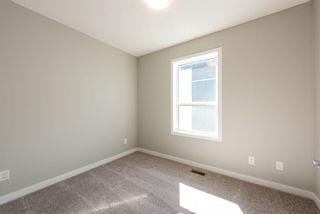 Photo 11: 121 301 REDSTONE Boulevard in Calgary: Redstone Row/Townhouse for sale : MLS®# A1246267