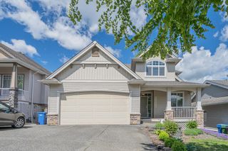 Photo 2: 34085 HIGGINSON Crescent in Abbotsford: Poplar House for sale in "College Meadows" : MLS®# R2887148