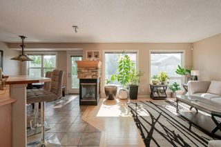 Photo 3: 100 WESTON Place SW in Calgary: West Springs Detached for sale : MLS®# A2079251